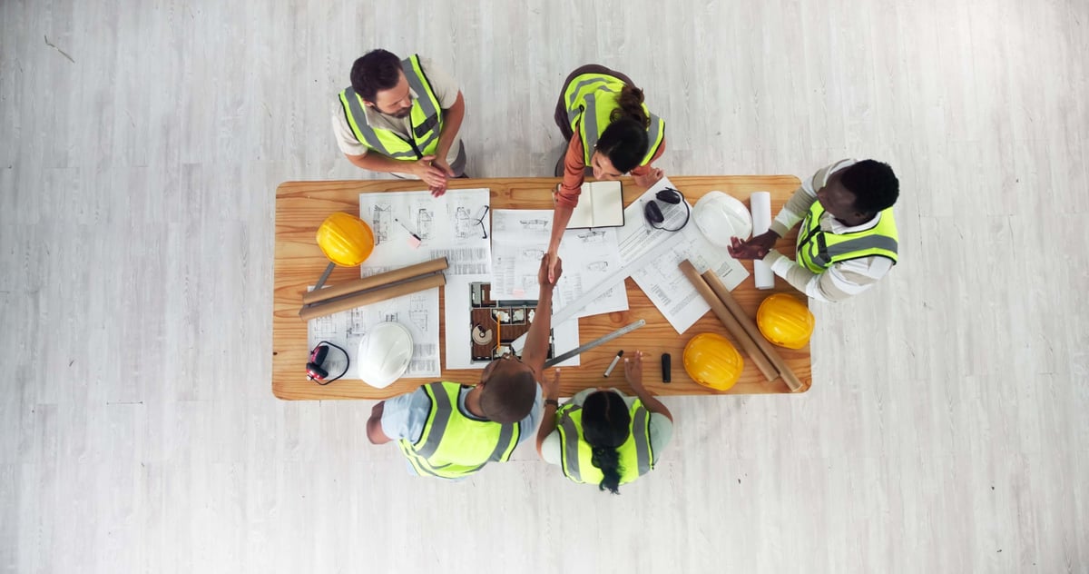 Architecture people handshake for teamwork building contract